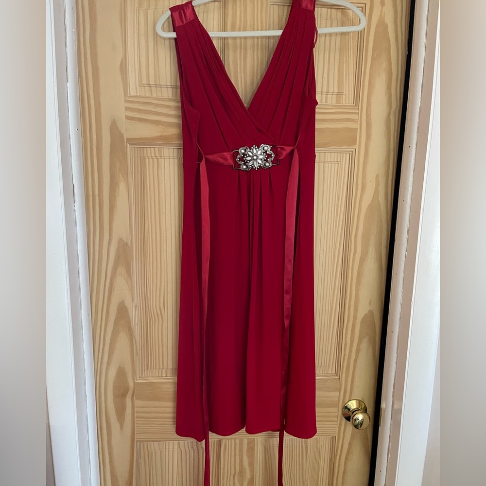 Red dress with ribbon tie in the back. Size 10